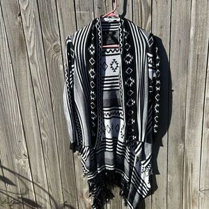 I Joal cardigan waterfall sides and fringed bottom. Size medim